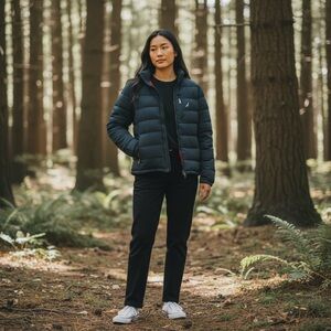 Nautica Women's Dark Blue Puffer Jacket with Vibrant Red Interior